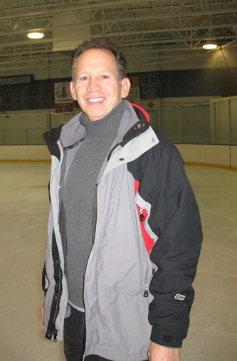 Phillip Mills in a photo for the Manleywoman Skatecast, a figure skating podcast