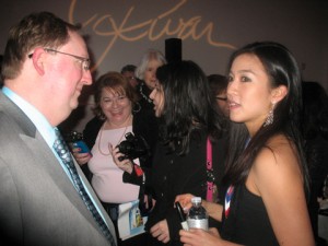 Michelle Kwan with a fan in a photo for the Manleywoman Skatecast, a figure skating podcast