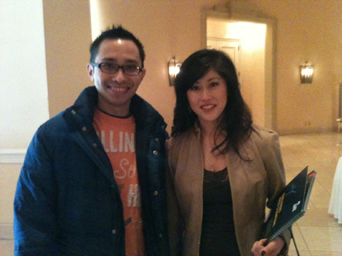 Krist Yamaguchi with a fan in a photo for the Manleywoman Skatecast, a figure skating podcast